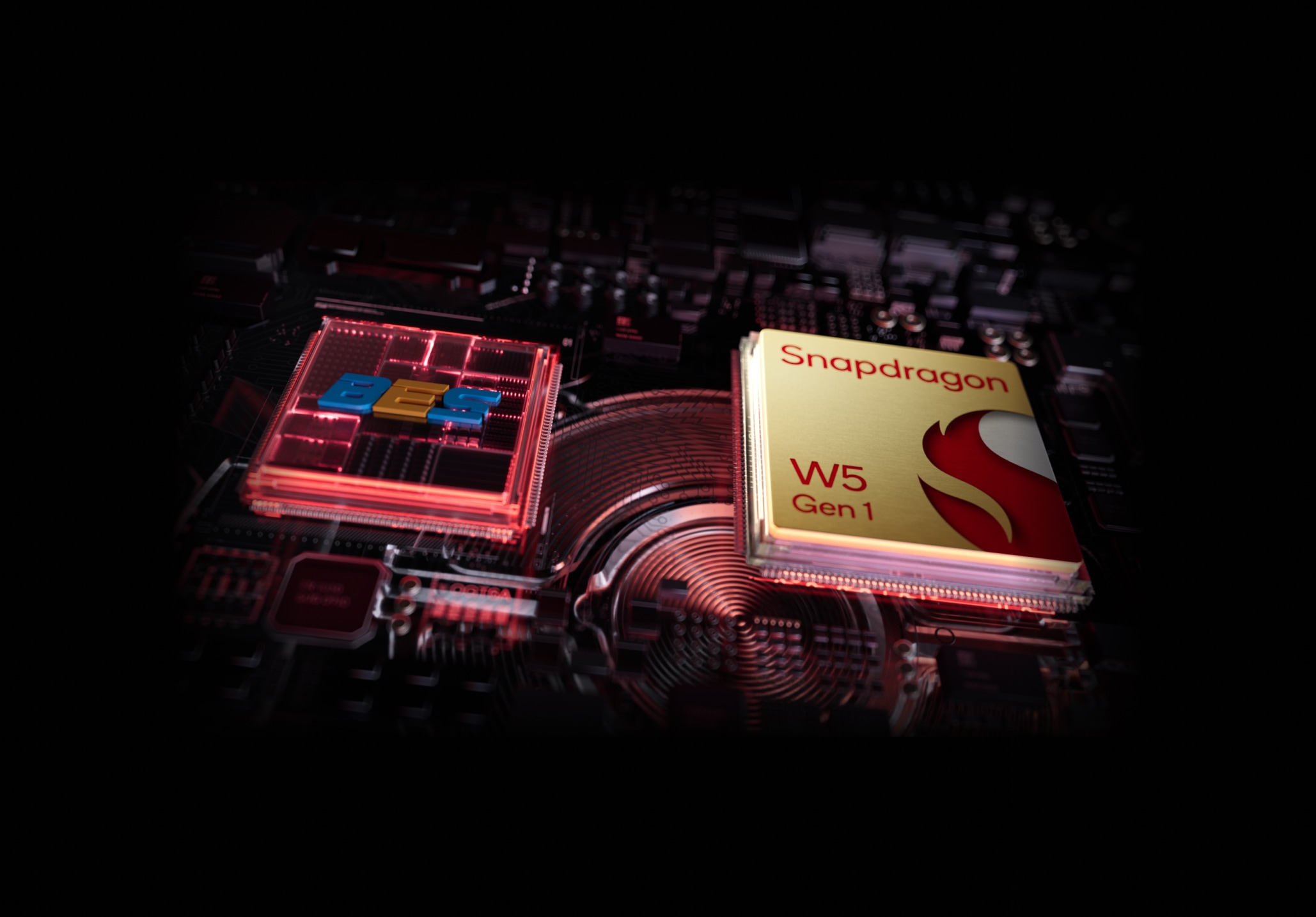 Red and gold electronic components on a dark background.